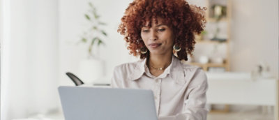A women working on laptop.