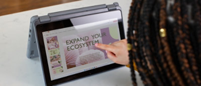 A person pointing at a screen