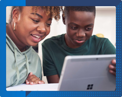 Women looking at a computer screen.