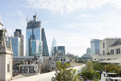 A cityscape featuring modern skyscrapers including The Leadenhall Building and The Scalpel, with a rooftop garden 