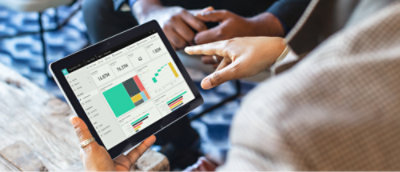 A dashboard is open in the tablet