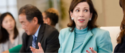 A group of people are discussing