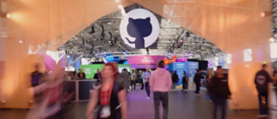 A group of people walking in a building.