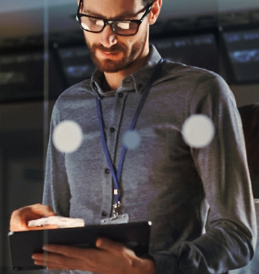 Closeup of a man holding tablet 