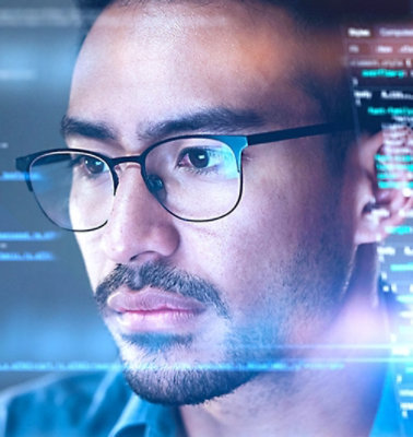 Closeup of face of man wearing specs