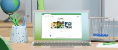 A laptop on a desk displays the Copilot webpage.