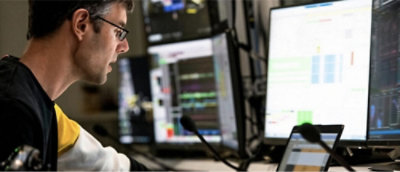 A person looking at a computer screen