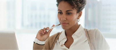 A person holding a pen