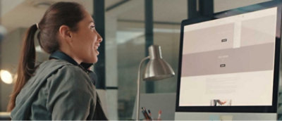 A person looking at a computer screen