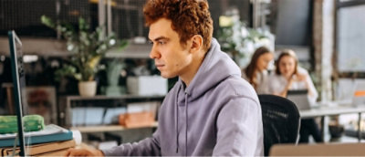 A person in a grey hoodie