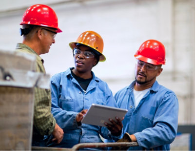 Three men discussing using Tablet.