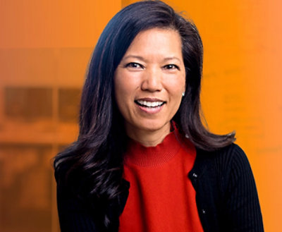 A close-up of a woman smiling.