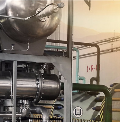 A close-up of a machine with the text 1=R- on it.