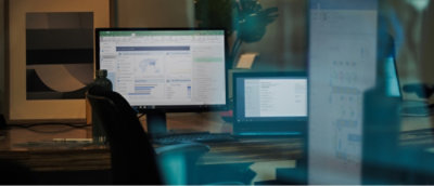 A person looking at a computer screen.