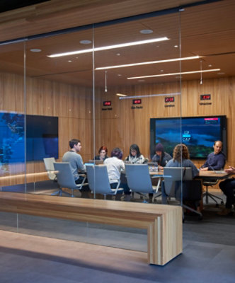 A group of people sitting around a table