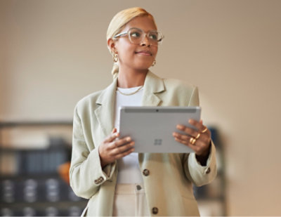 A person holding a tablet.