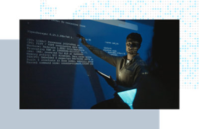 Person presenting technical information while pointing to code projected on a large screen. Provide your feedback on BizChat