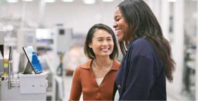 A close-up of a woman smiling.