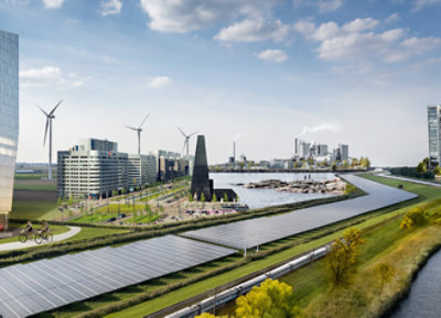 Solar panels and wind turbines in a city with a blue sky and clouds.