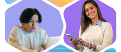 A man and woman looking at a tablet.