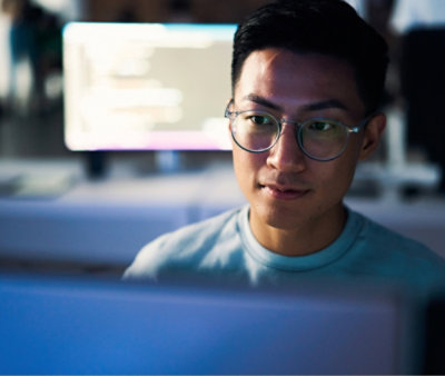 A person looking at a computer