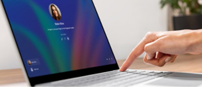 A laptop computer showing windows login screen