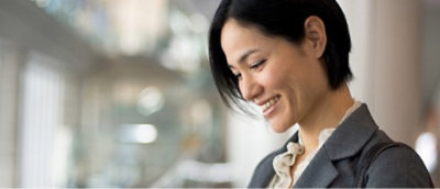 A close-up of a woman smiling.
