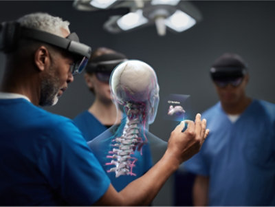A man and woman wearing virtual reality goggles.