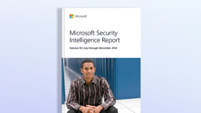 A book cover with person sitting in front of a computer and the text Microsoft Security Intelligence Report visible on the screen.