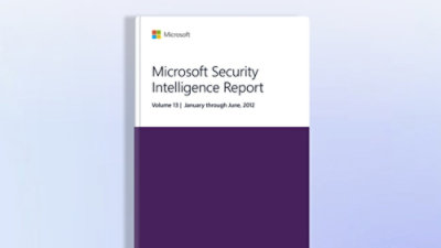 A close-up of a book with a white and purple cover featuring text Volume 13: January–June 2012.