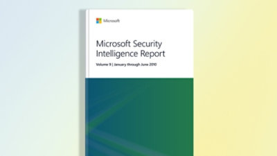 A close-up of a book with a white and green cover displaying the text Microsoft Security Intelligence Report, Volume 9: January–June 2010.