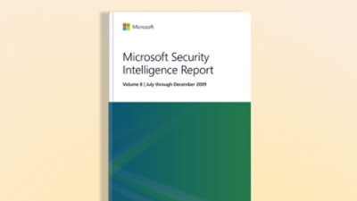 A close-up of a book with a white and green cover displaying the text Microsoft Security Intelligence Report, Volume 8: July–December 2009.