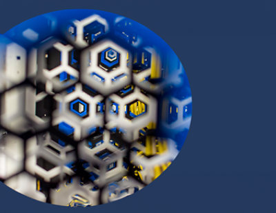 Niebiesko-żółty okrąg z sześciokątami w środku.