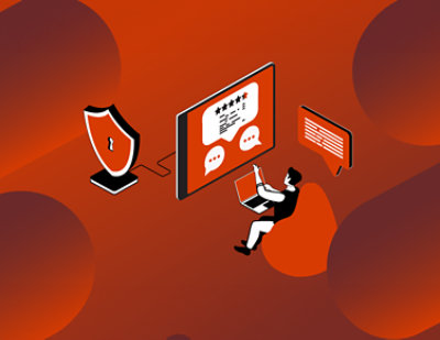 Asmuo sėdi priešais kompiuterį