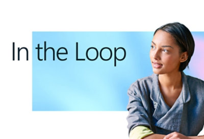 Banner with text “In the loop” and person seated looking to the side
