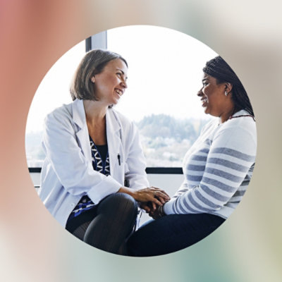 A woman holding hands with another woman.