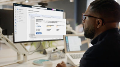 A man is working on his PC.