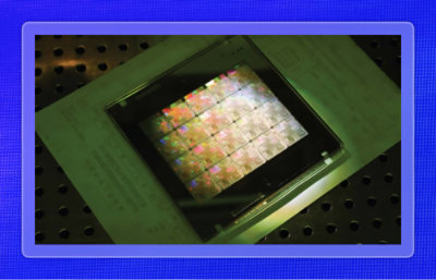 Close-up of a semiconductor chip with an illuminated silicon wafer.
