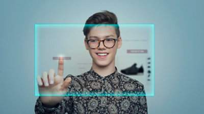 A man wearing virtual reality goggles.