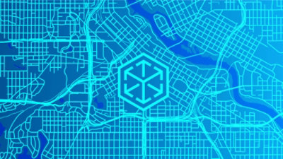 A blue city map with a hexagon logo.