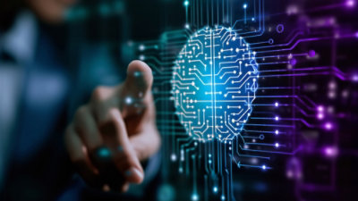 A hand touching a digital brain.