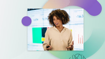 A woman with curly hair and a remote control