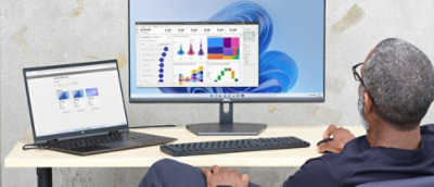 A man looking at the desktop