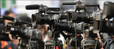Four news cameras.