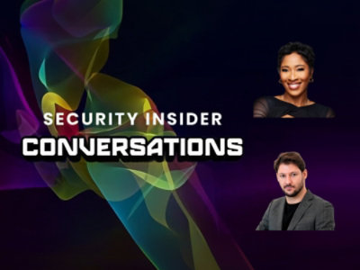 A man in a suit and a woman smiling at the camera with the text SECURITY INSIDER CONVERSATIONS on a colorful smoke background.
