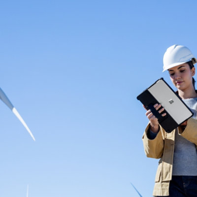 A person holding a tablet.