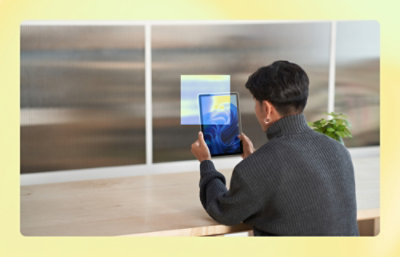 A man holding a tablet.