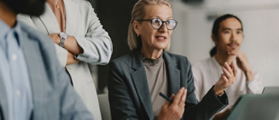 A group of people talking with eatch other.
