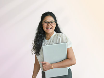 A person holding a computer