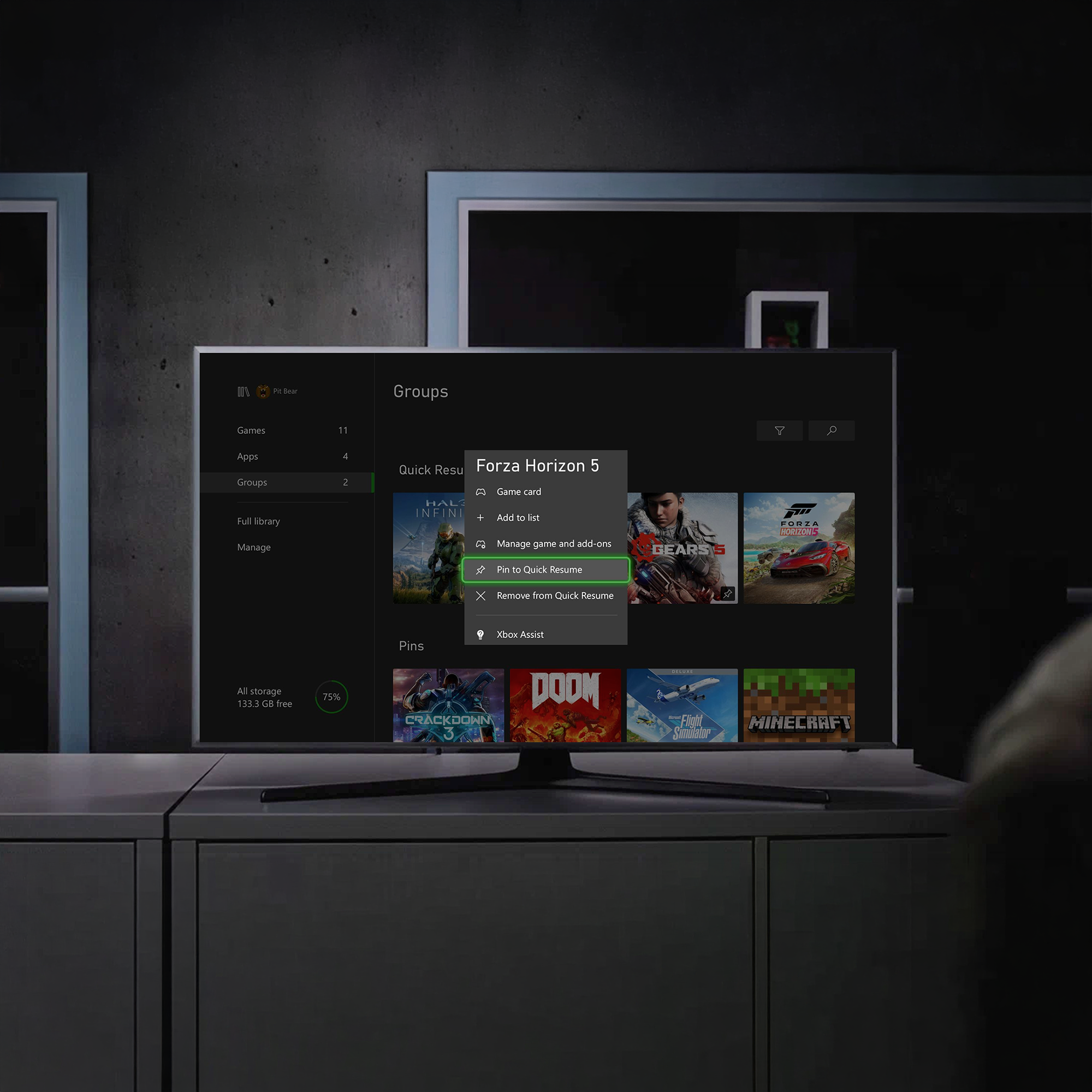 A TV screen showing the Quick Resume feature on the XBOX dashboard.